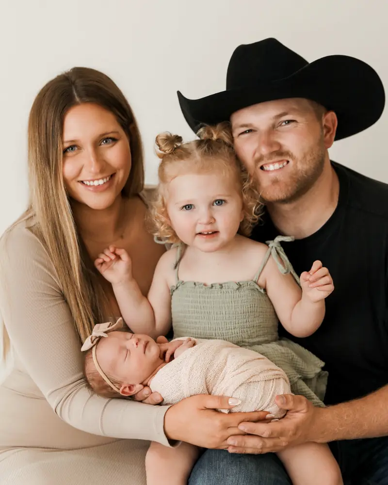 Kacie and Cole McBee with their daughters Blair and Tate